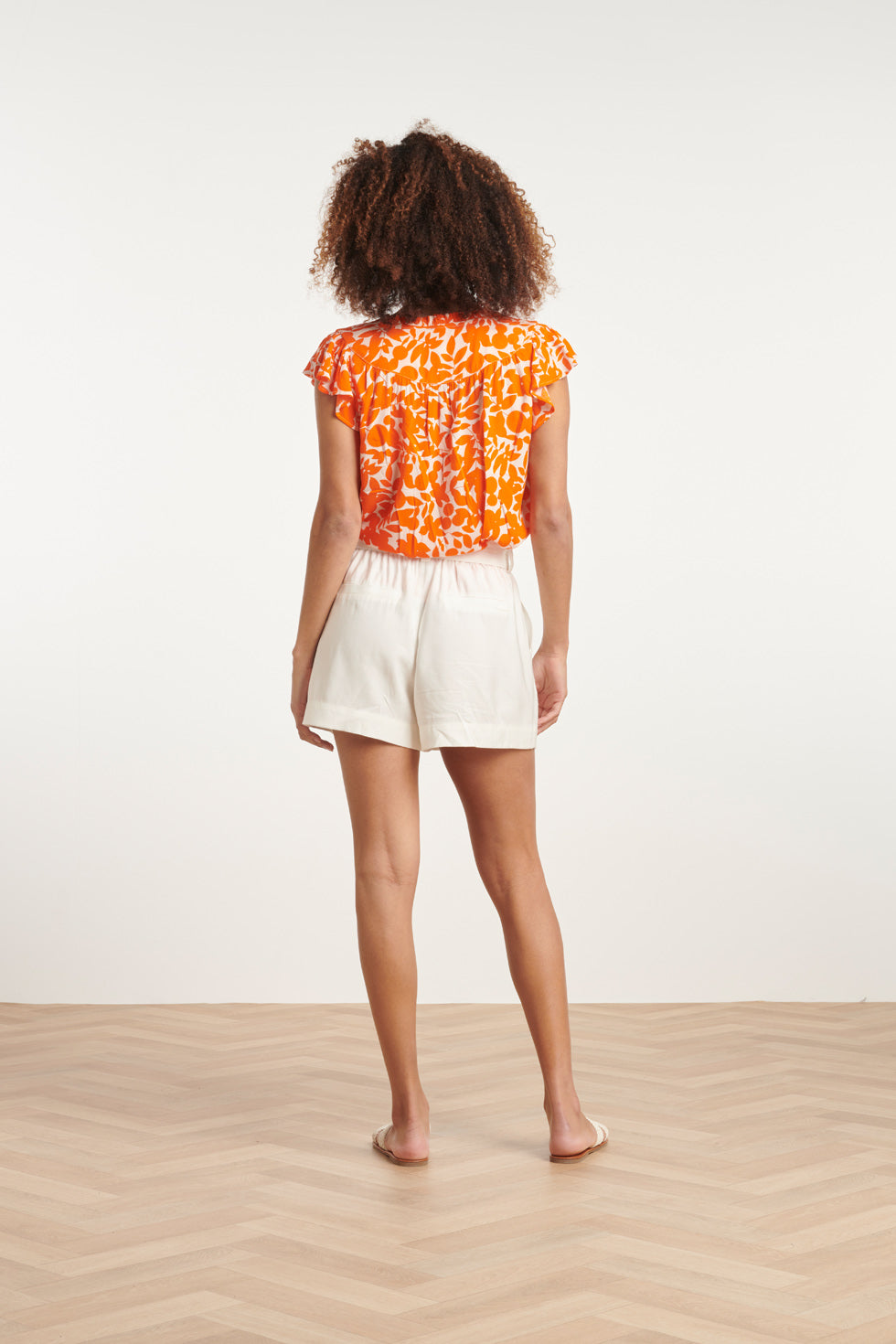 24136 Orange Top Met Bladerprint